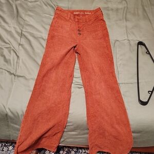 American Eagle Outfitters Women's Flare Jeans in Rust. Used; Still Has Life Left